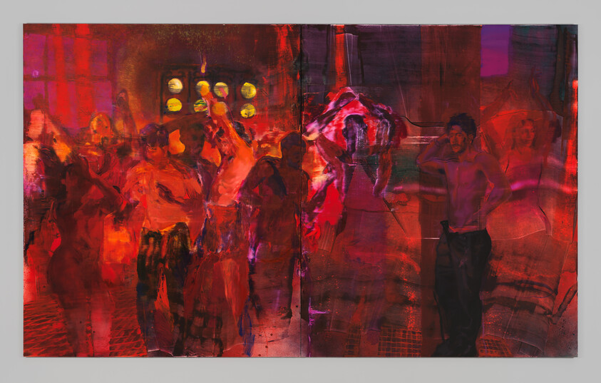 People dancing energetically in a dimly lit, colorful room with vibrant red and orange hues.