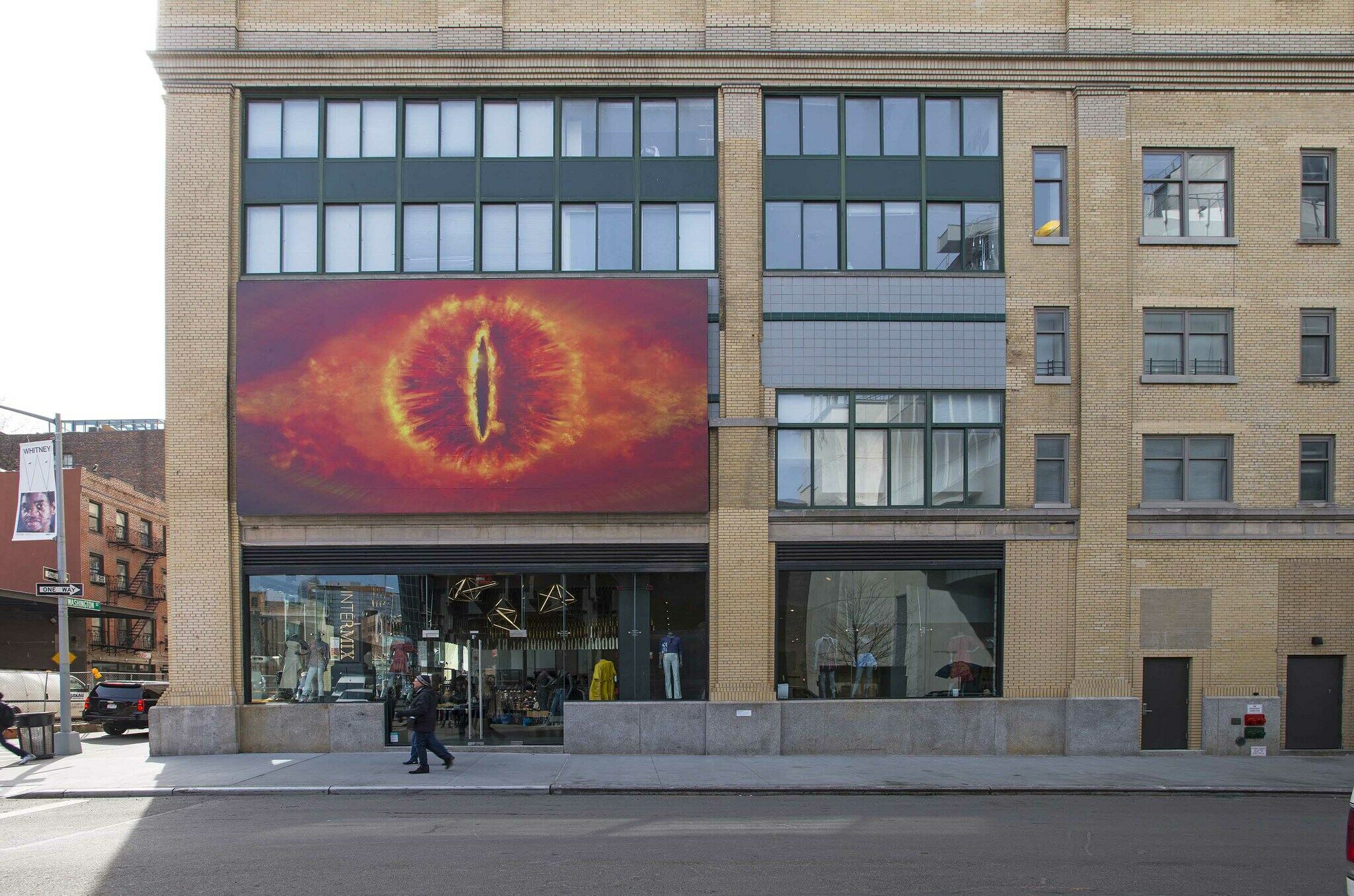 A work of art displayed on the outside of a building.