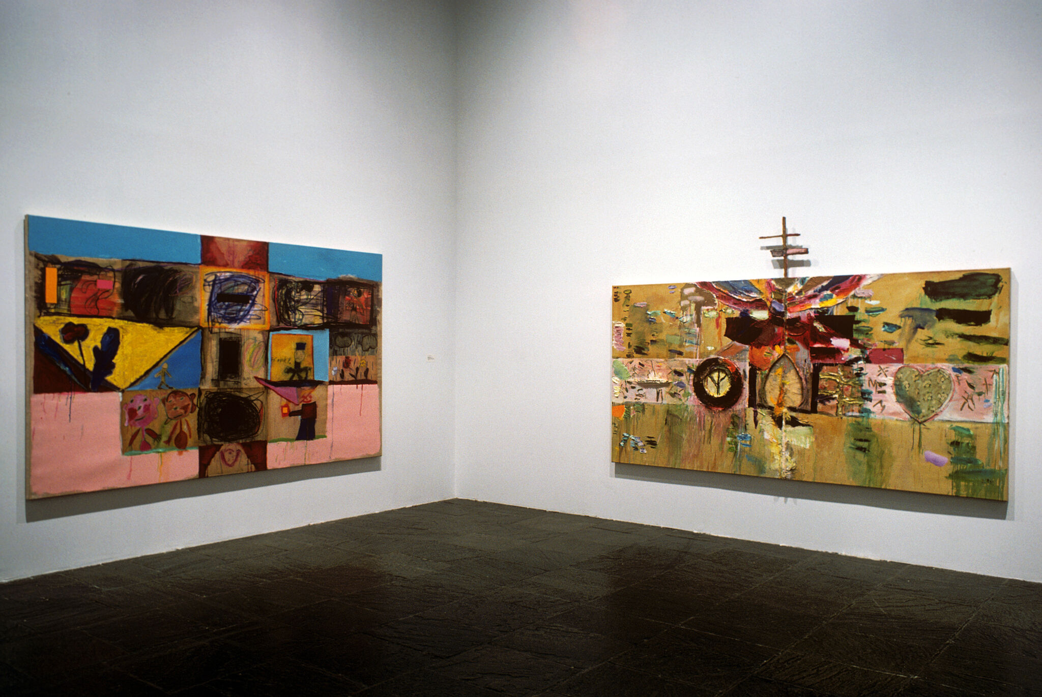 Two works of art in a gallery.