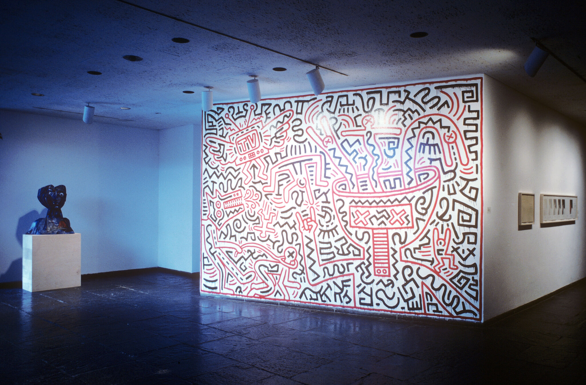 A gallery filled with works of art.