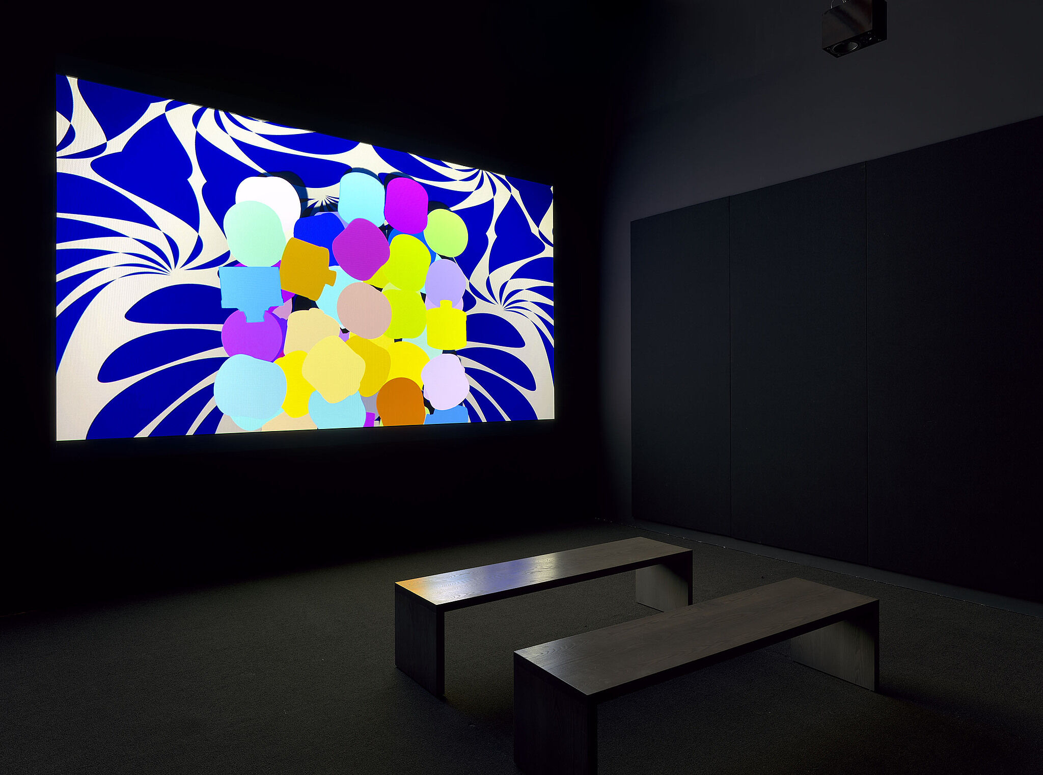 An installation view of a video projection in a gallery.