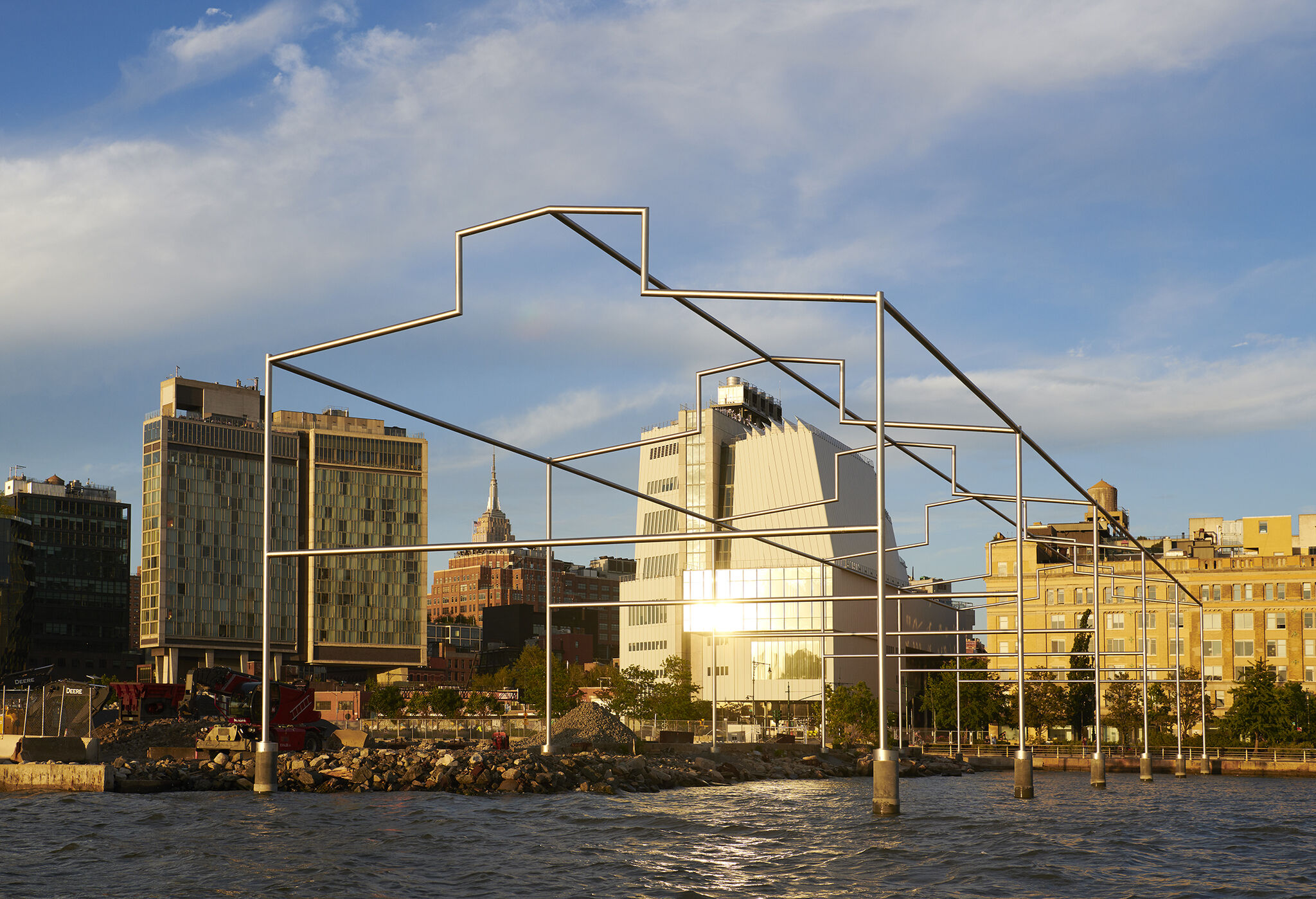 Day's End steel sculpture, with the Whitney Museum and Manhattan skyline in the background.