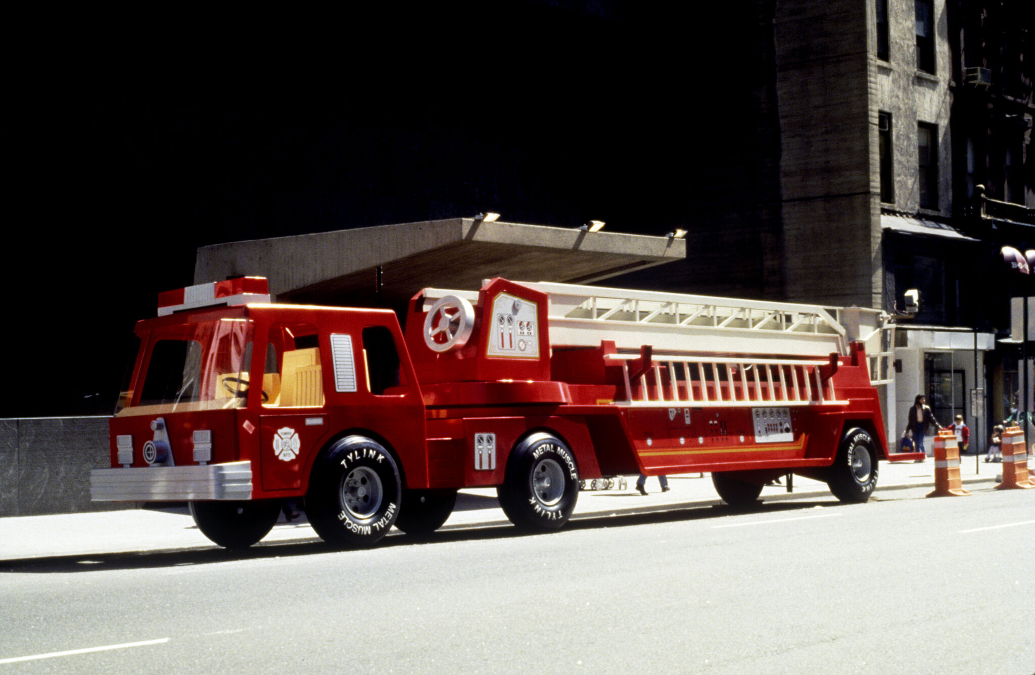 Fire truck parked in front of the museum.