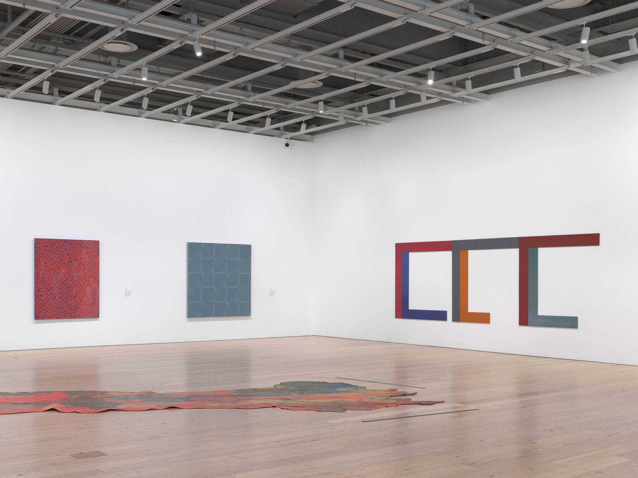 Artworks in a light-filled gallery.