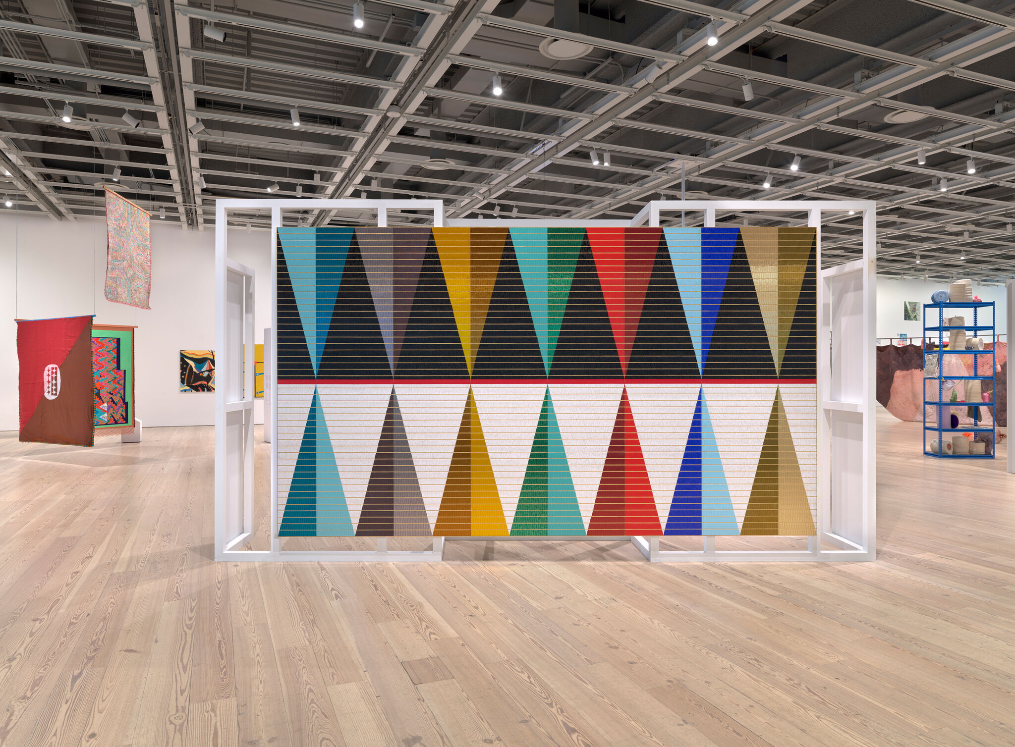 Two rolls of colorful triangles mirroring each other