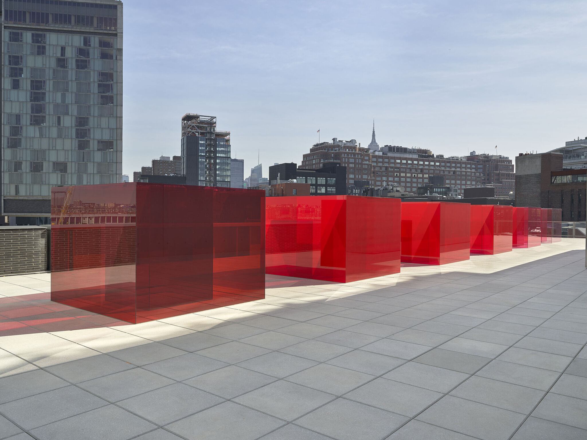 Sculptures displayed outside.