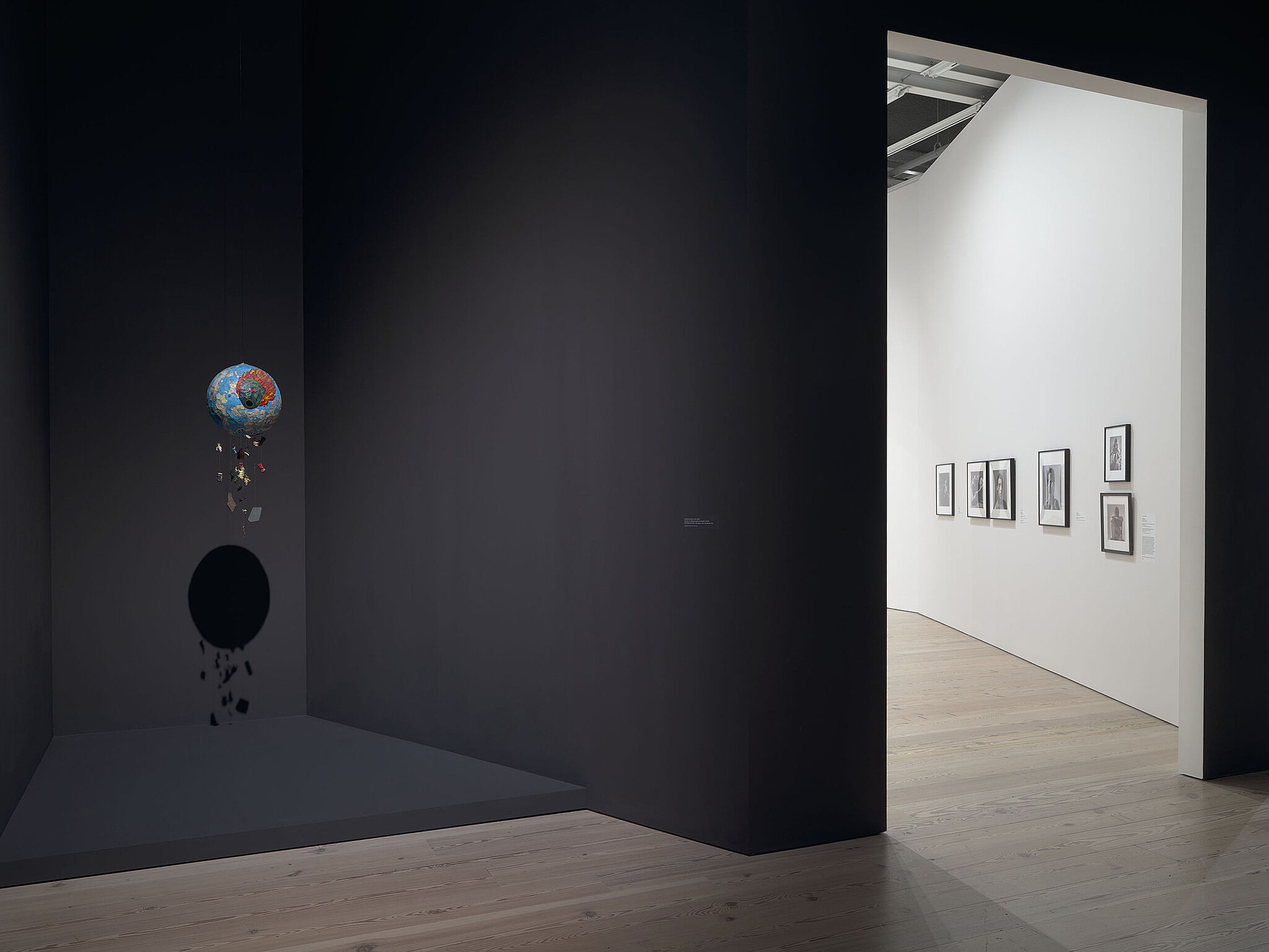 An image of the Whitney galleries with various artworks on the wall and in cases